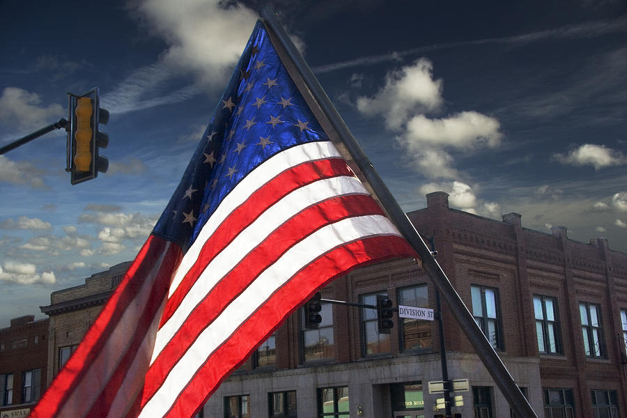 American Flag Flowing In Urban Landscape Photograph by Randall Nyhof