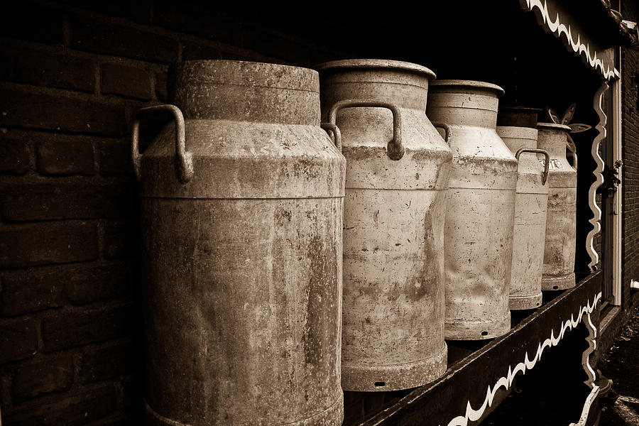 Cheese Photograph - AMS-0031-Milk Canisters In Edam by Les Abeyta