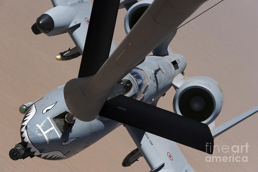 An A-10 Thunderbolt II Receives Fuel Photograph by Stocktrek Images
