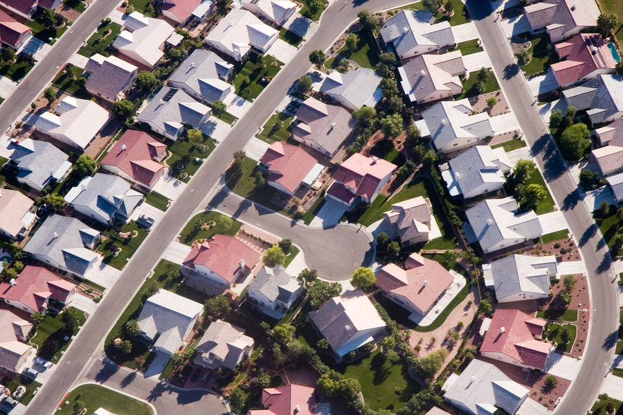 An Aerial View Of A Subdivision In Las by Taylor S. Kennedy