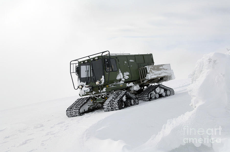 An All-terrain Vehicle Gets Stuck Photograph by Stocktrek Images