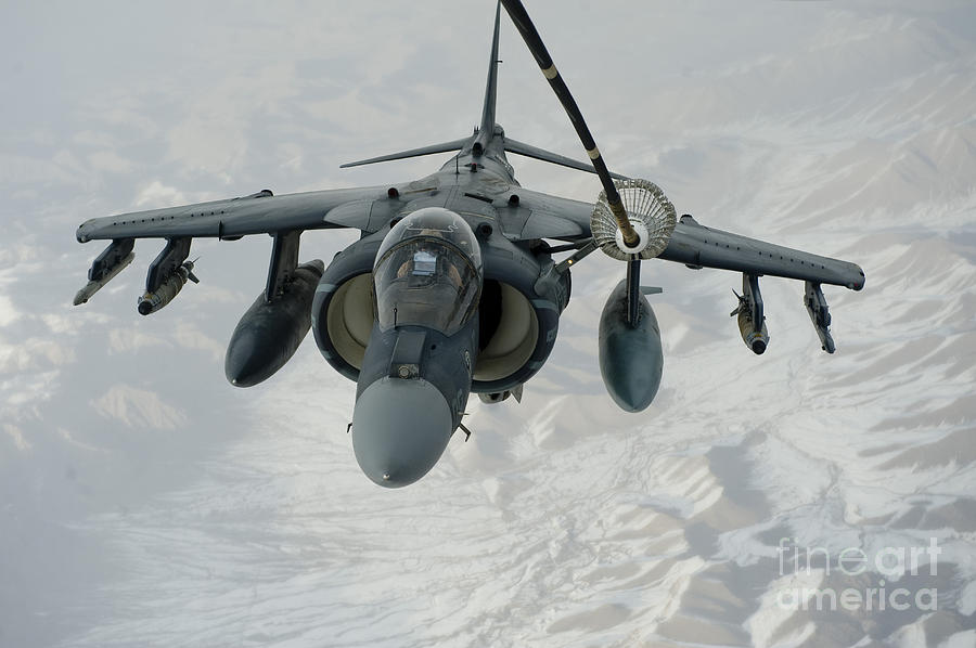 An Av-8b Harrier Receives Fuel Photograph by Stocktrek Images - Pixels