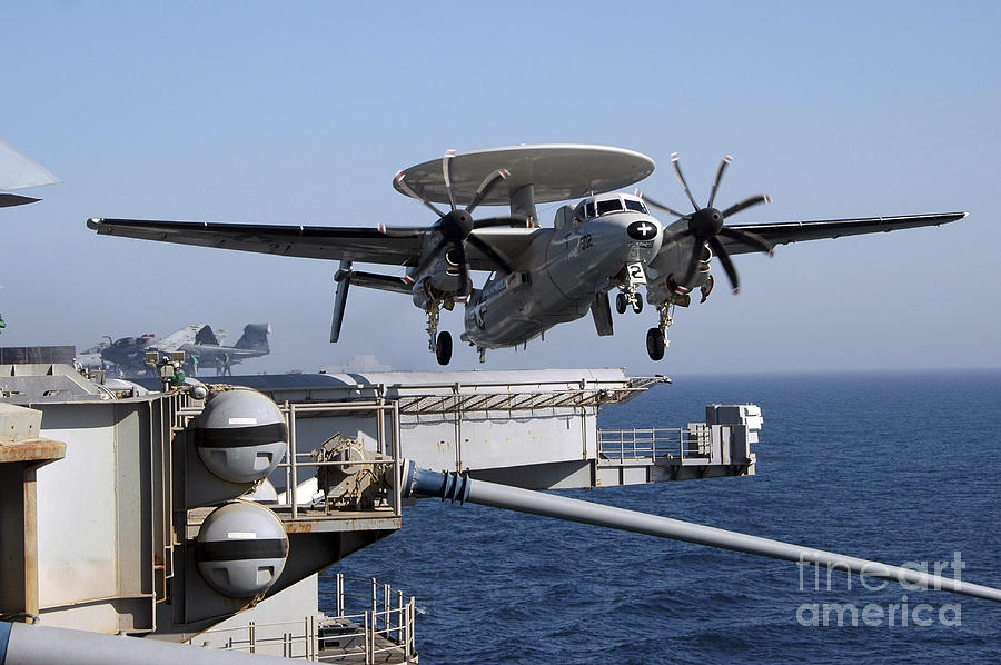 An E-2c Hawkeye Launches Off The Flight Photograph by Stocktrek Images