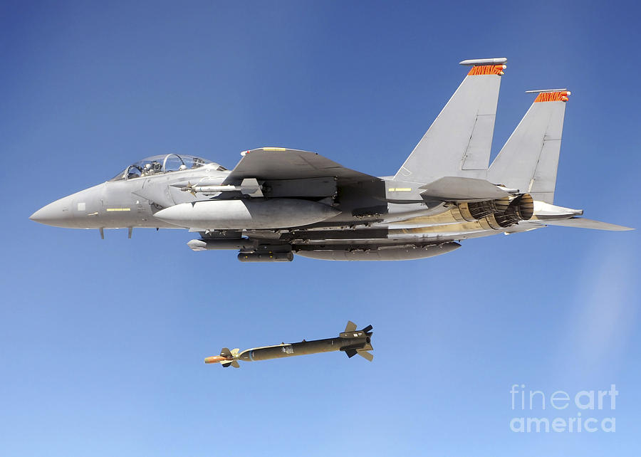 An F-15e Strike Eagle Drops A Gbu-28 Photograph by Stocktrek Images