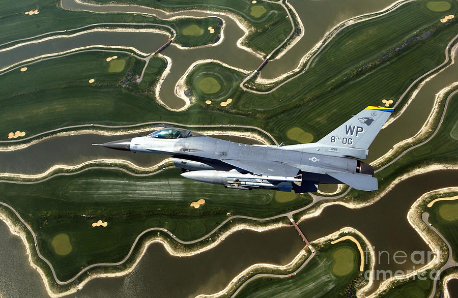 An F-16 Fighting Falcon Flies Near Base Photograph by Stocktrek Images