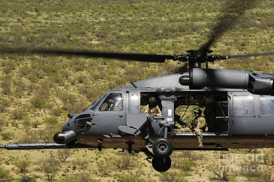Tucson Photograph - An Hh-60 Pave Hawk Flies by Stocktrek Images
