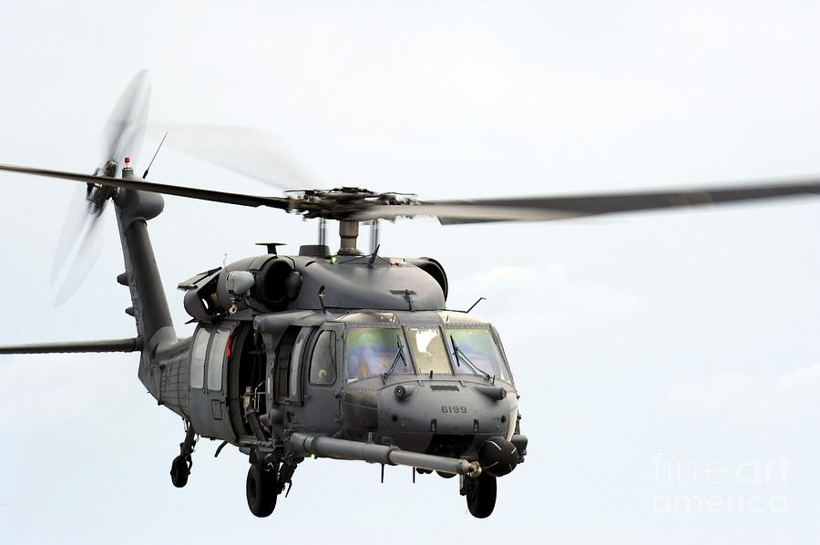 An Hh-60 Pave Hawk Helicopter Conducts Photograph
