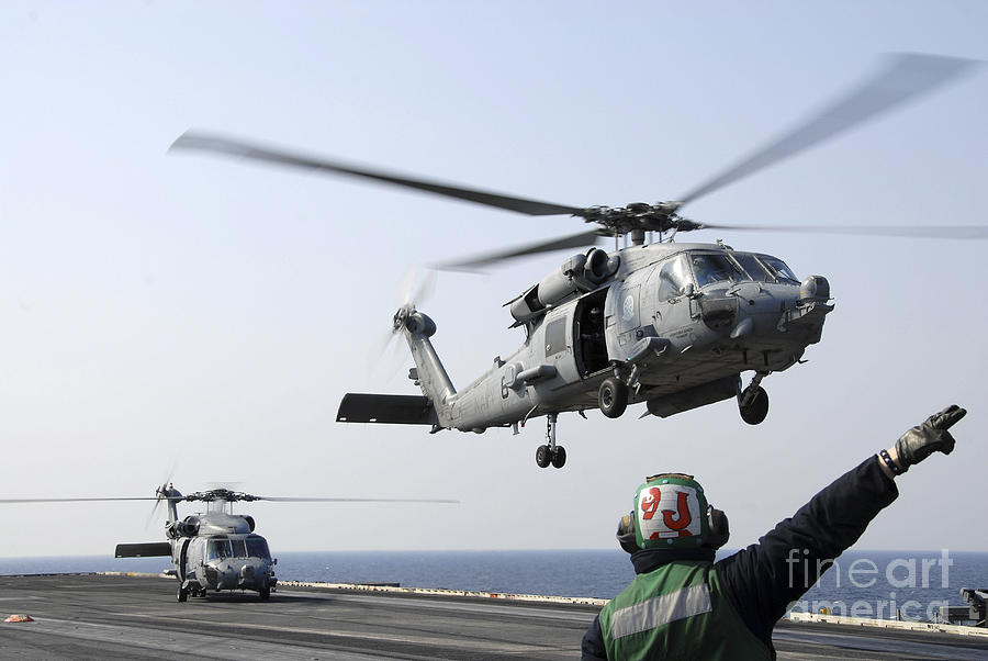 An Hh-60h Sea Hawk Helicopter Takes Photograph