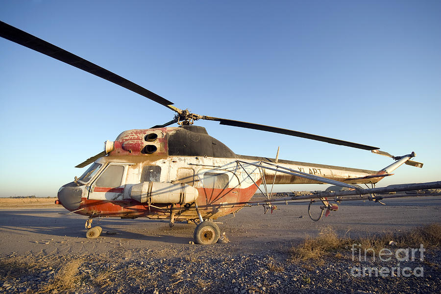 An Iraqi Helicopter Sits On The Flight Photograph