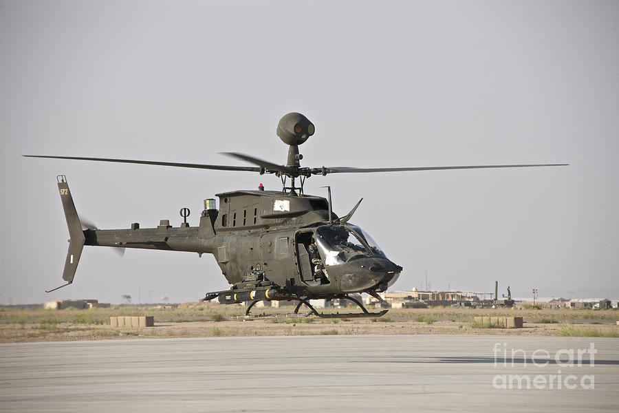Transportation Photograph - An Oh-58d Kiowa Helicopter Takes by Terry Moore
