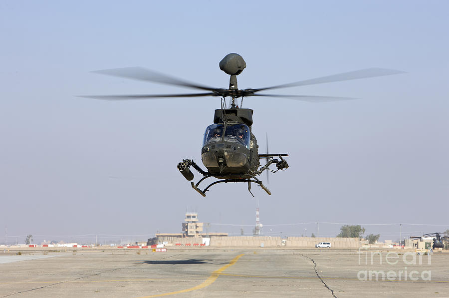 An Oh-58d Kiowa Warrior Hovers Photograph by Terry Moore