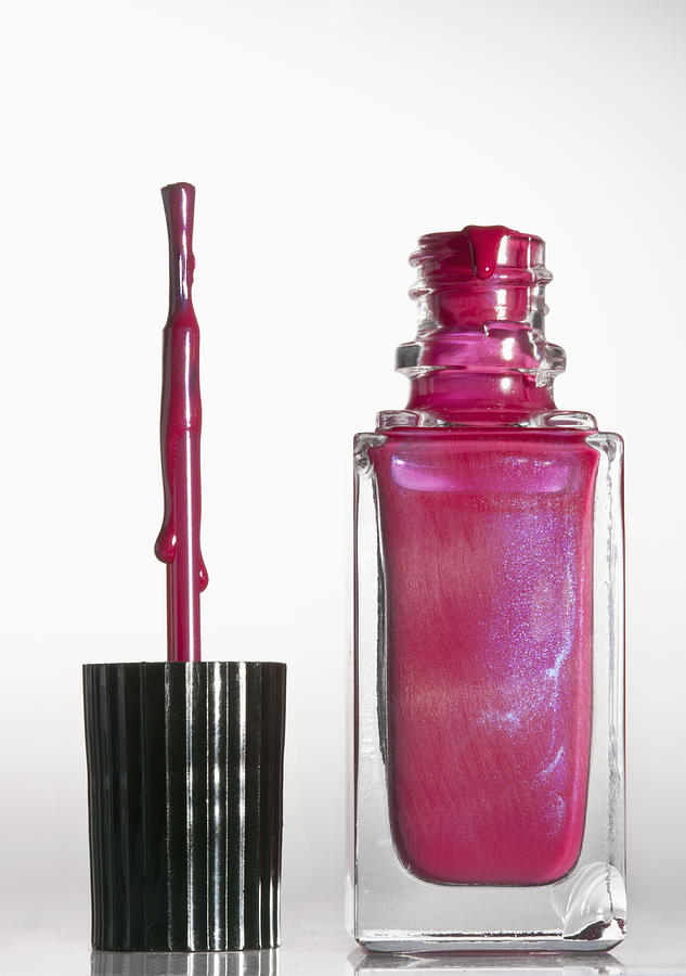 An Open Bottle Of Pink Nail Polish Photograph by Larry Washburn