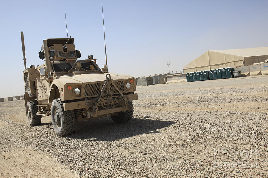 An Oshkosh M-atv Sits Parked At Camp Photograph by Stocktrek Images ...