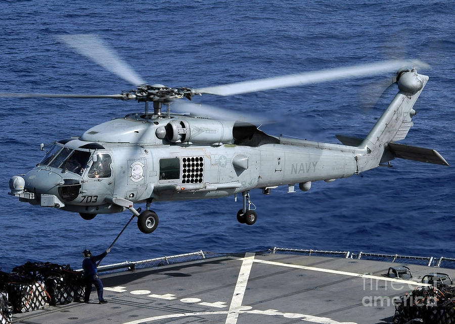 An Sh-60b Seahawk Helicopter Performs Photograph by Stocktrek Images