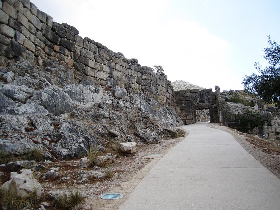 Ancient Walkway Entrance to the Hilltop Mountain Range and Archeological Remains in Mycenae Greece Photograph by John Shiron