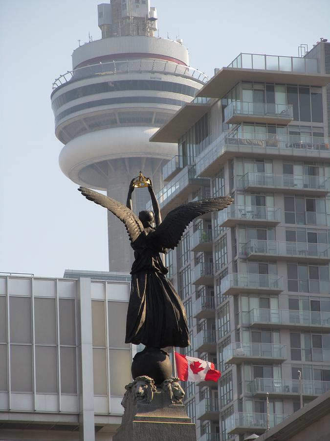 angel with CN Tower Toronto Photograph by Alfred Ng