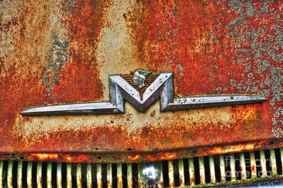 Antique Mercury Auto Logo Photograph by Dan Stone