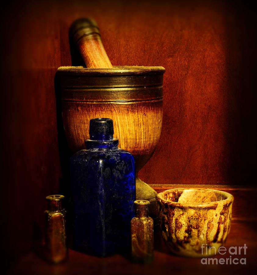 Apothecary - Wood mortar and pestle Photograph by Paul Ward