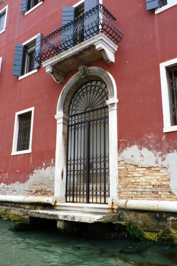 Arched Door and Balcony Photograph by Carla Parris