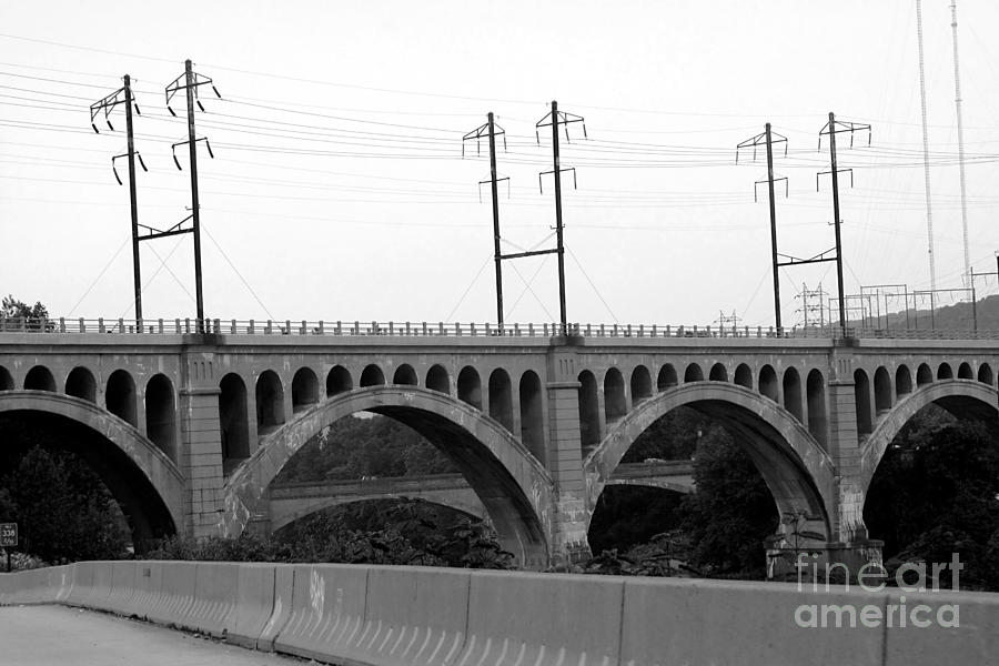 Arched Railroad Bridge in Black and White Photograph by Susan Stevenson