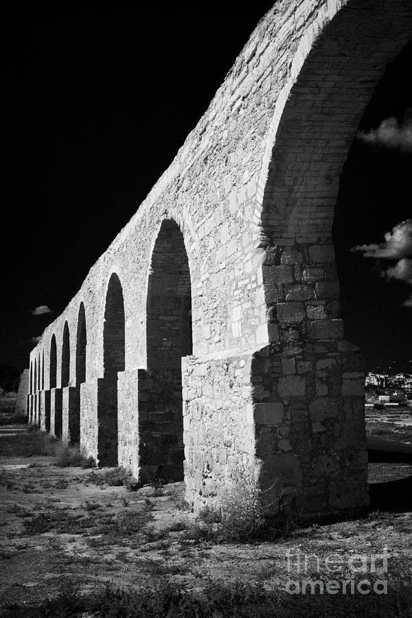 Landmark Photograph - Arches Of The Kamares Aqueduct Larnaca Republic Of Cyprus Europe by Joe Fox