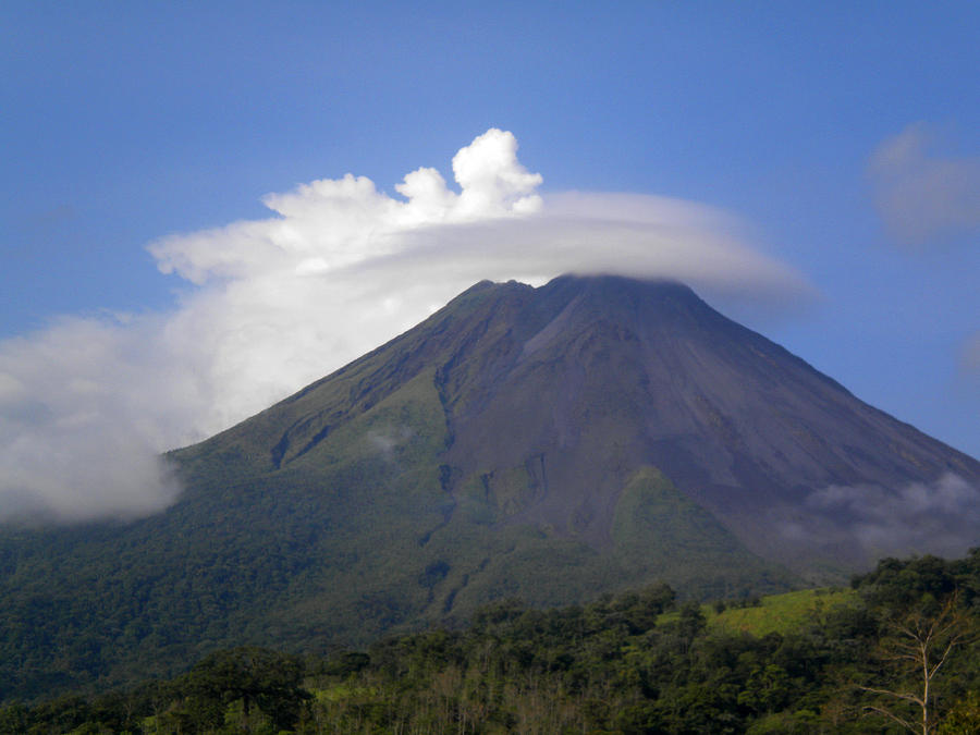 Arenal Volcano And Clouds Photograph by Todd Breitling