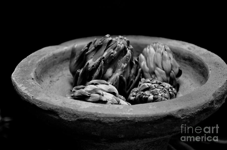 Artichokes In A Stone Dish Photograph by Tatyana Searcy