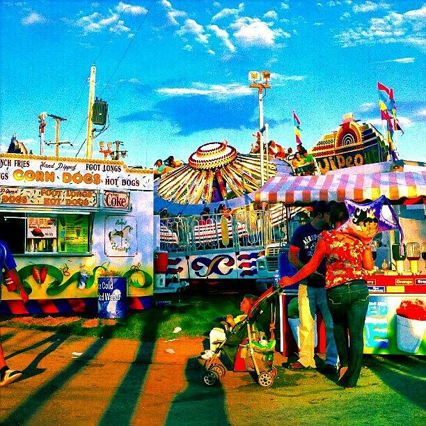 As The Shadows Lengthen At The Carnival Photograph by Marianne Dow