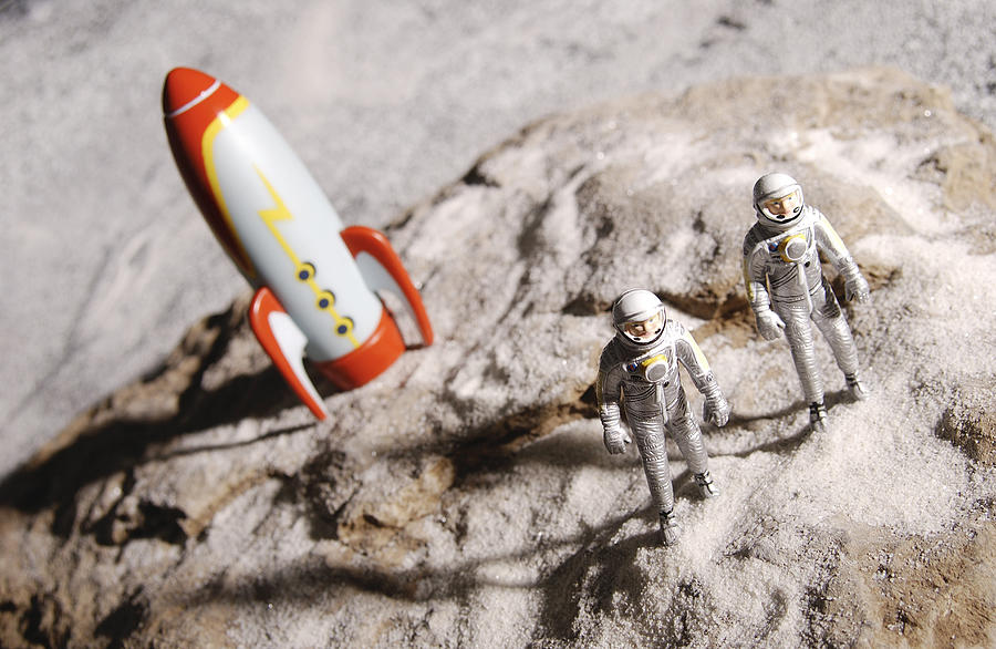 Astronaut Figurines And Toy Rocket Photograph by Hemera Technologies