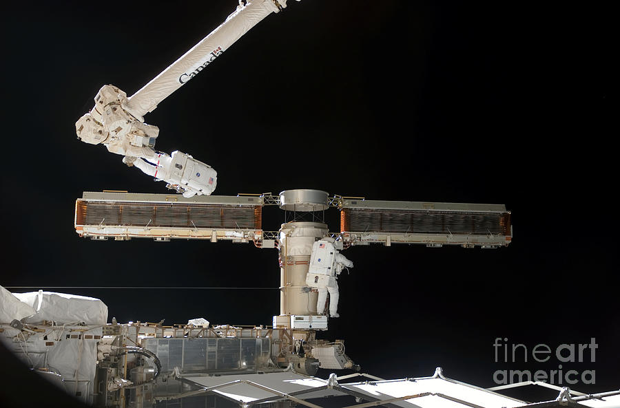 Astronaut Works On Solar Array Photograph by Nasa