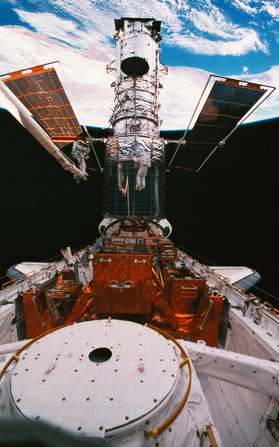 Globe Photograph - Astronauts Working On A Satellite Docked On The Space Shuttle by Stockbyte