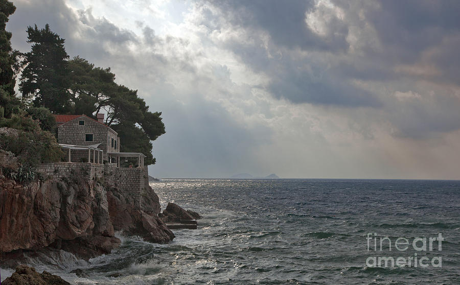 At the edge of the sea in Dubrovnik Photograph by Madeline Ellis