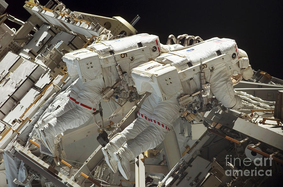 Space Photograph - Atlantis Astronauts On Spacewalk by Nasa