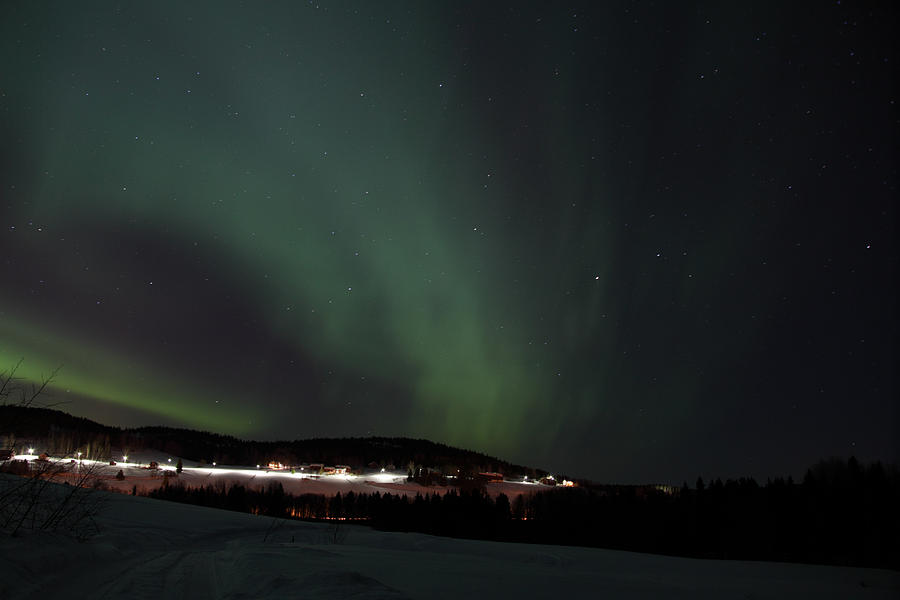Aurora borealis shining over a village Photograph by Ulrich Kunst And Bettina Scheidulin