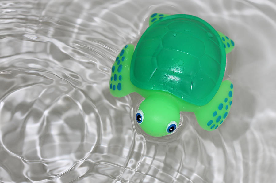 Baby Bath Toy In Water Ripples Photograph by Tracie Schiebel