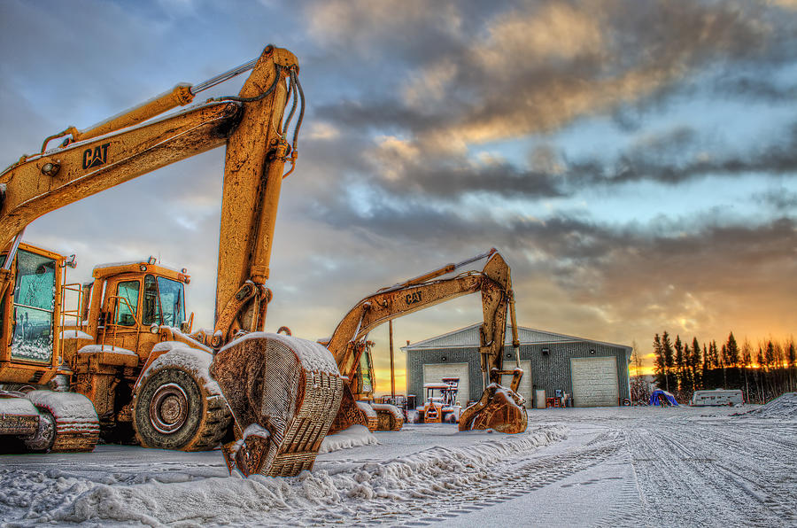 Winter Photograph - Backhoes in a Row by Thomas Payer