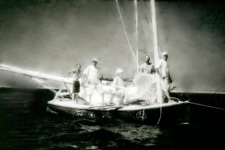 Bahamian sailboat race Photograph by Jean Wolfrum