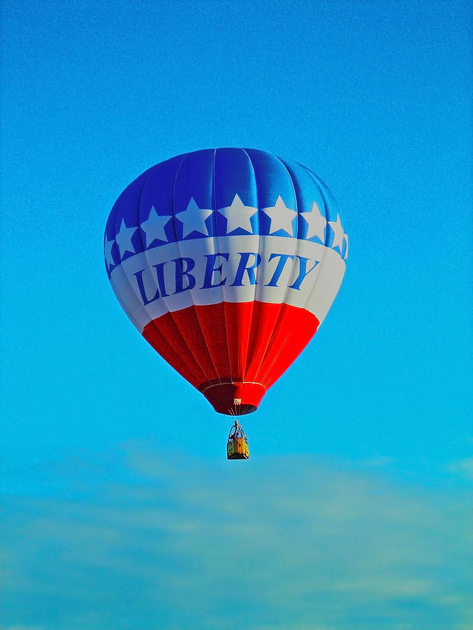 Ballon in Flight Photograph by Juergen Weiss