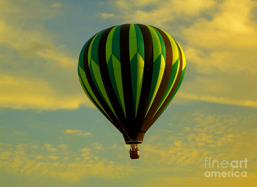 Balloon Ride Through Gold Clouds Photograph by Robert Frederick