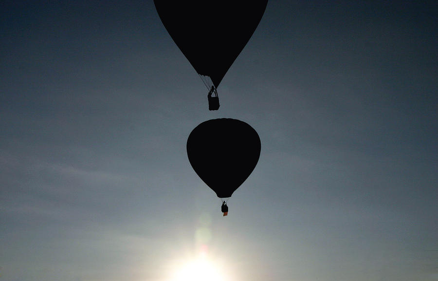 Balloons at Sunrise Photograph by Joe Myeress