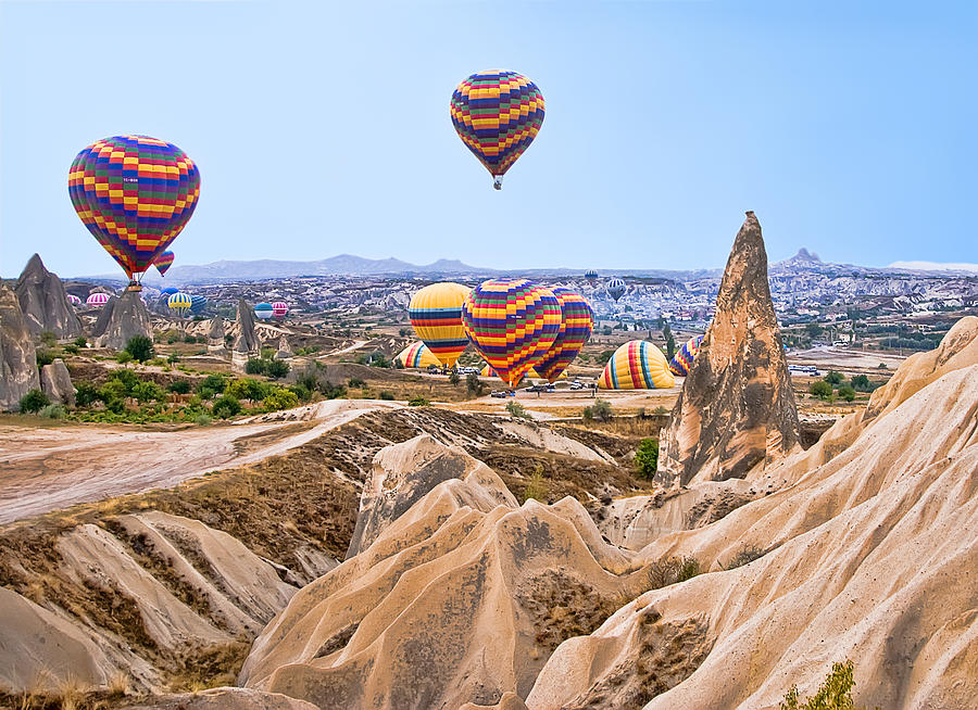 Balloons over Cappadocia Photograph by Betty Eich