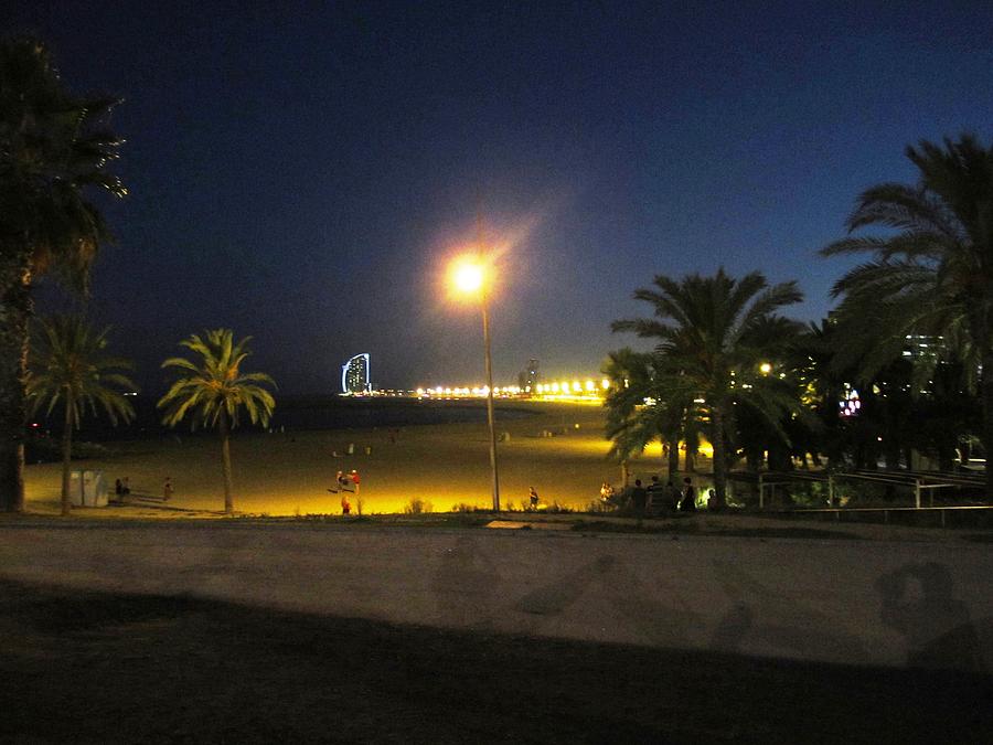 Barcelona Beach Pier By Night Light pole in Spain Photograph by John Shiron