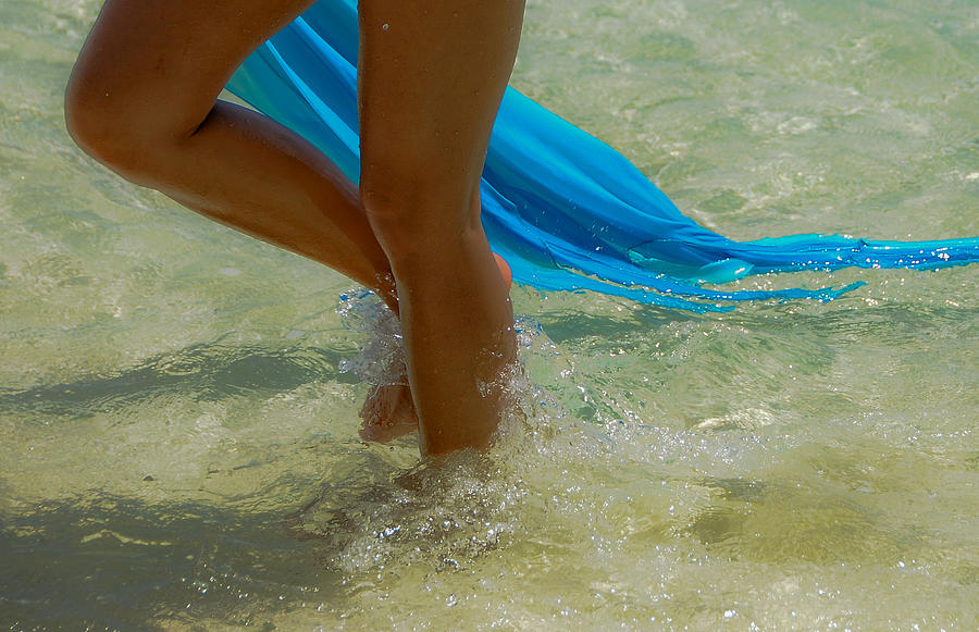 Beautiful woman legs in the crystal water Photograph by Jenny Rainbow