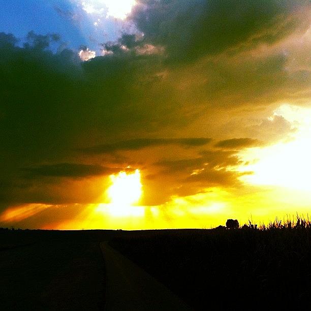 Sunset Photograph - Before The Thunderstorm by Charlotte Ashu