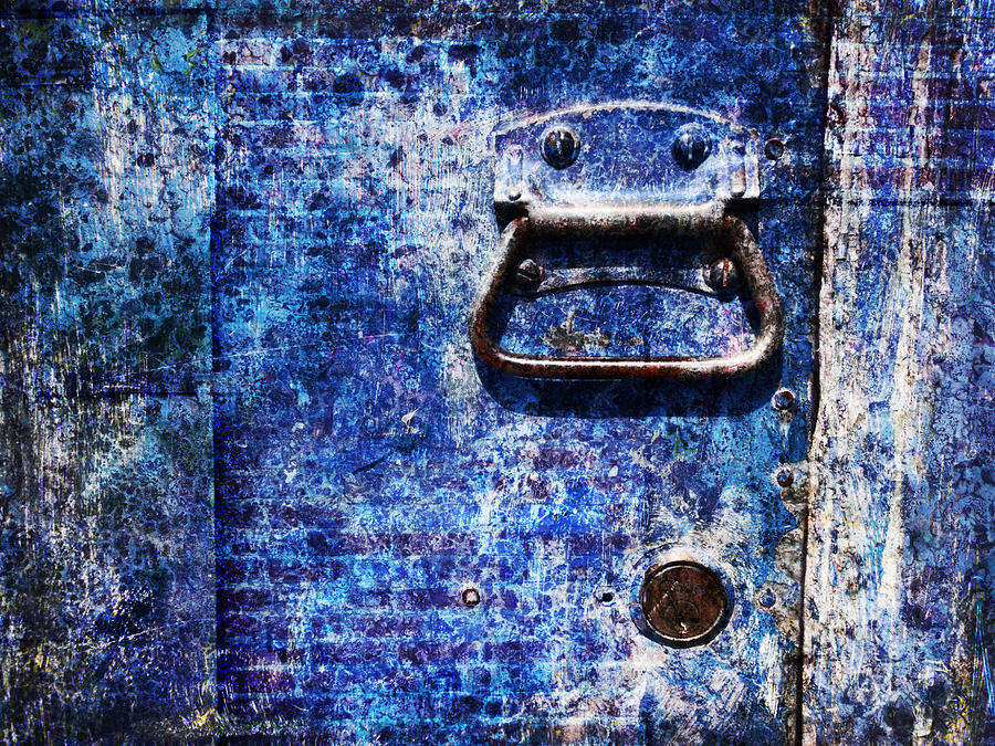 Behind the Blue Door Photograph by Kathy Clark