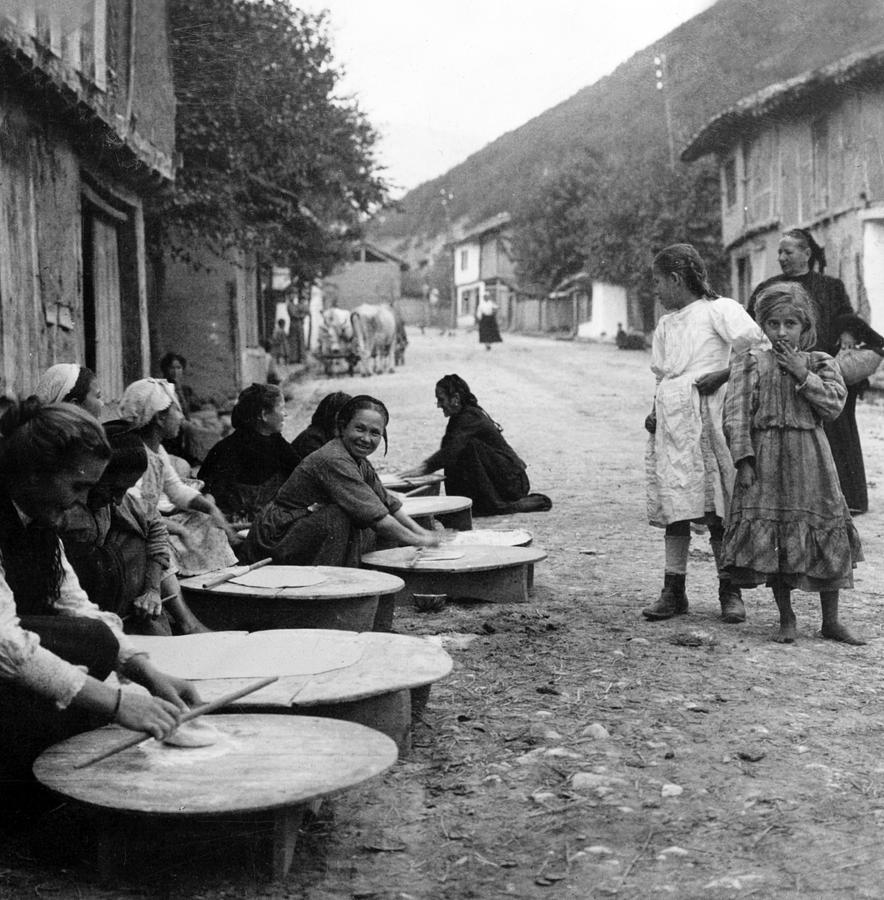 Berkovitsa Bulgaria - Women making bread in the streets - c 1911 Photograph by International  Images