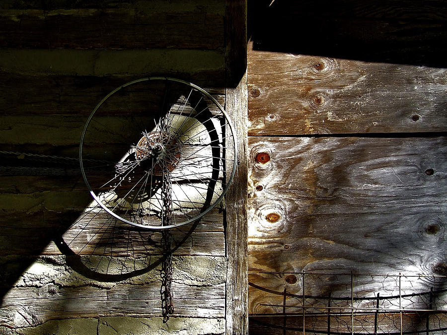 Bicycle Wheel On Wall Photograph by Richard Gregurich