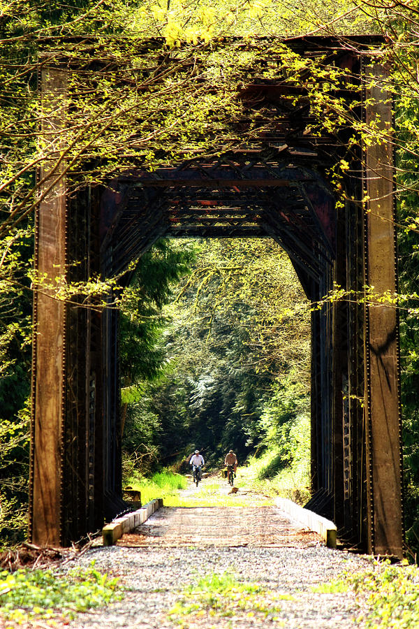 Bicycling Across Old Train Bridge Photograph by Tracie Schiebel
