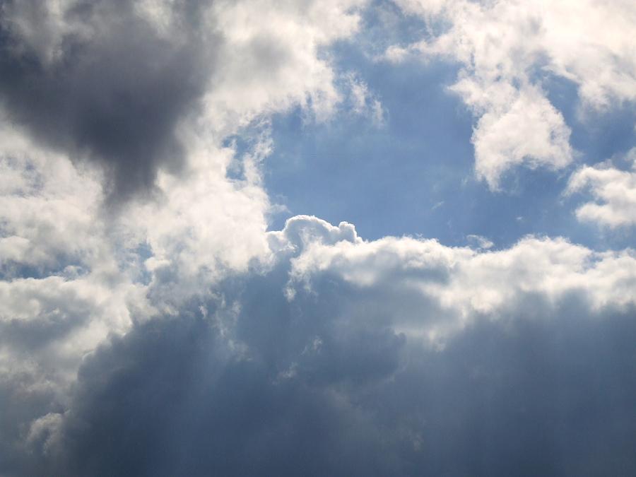 Big Fluffy Clouds Photograph