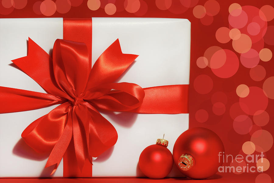 Christmas Photograph - Big red bow on gift  by Sandra Cunningham